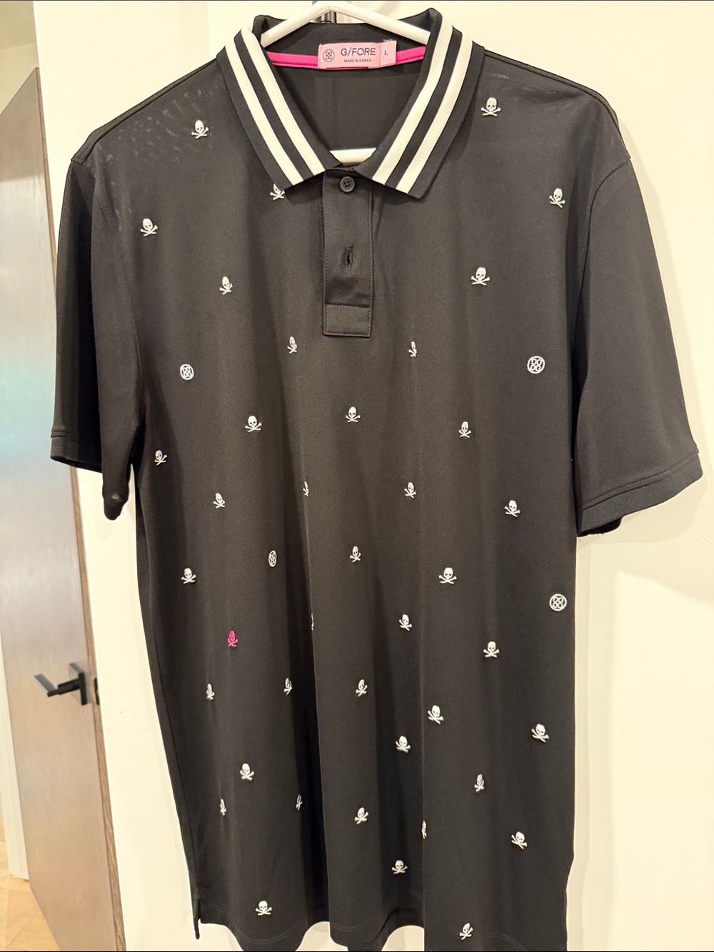 G/FORE Men’s Black Polo with White Micro Skull Embroidery